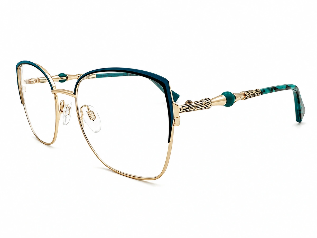 Custom metal eyeglasses with teal brow accents and detailed temples