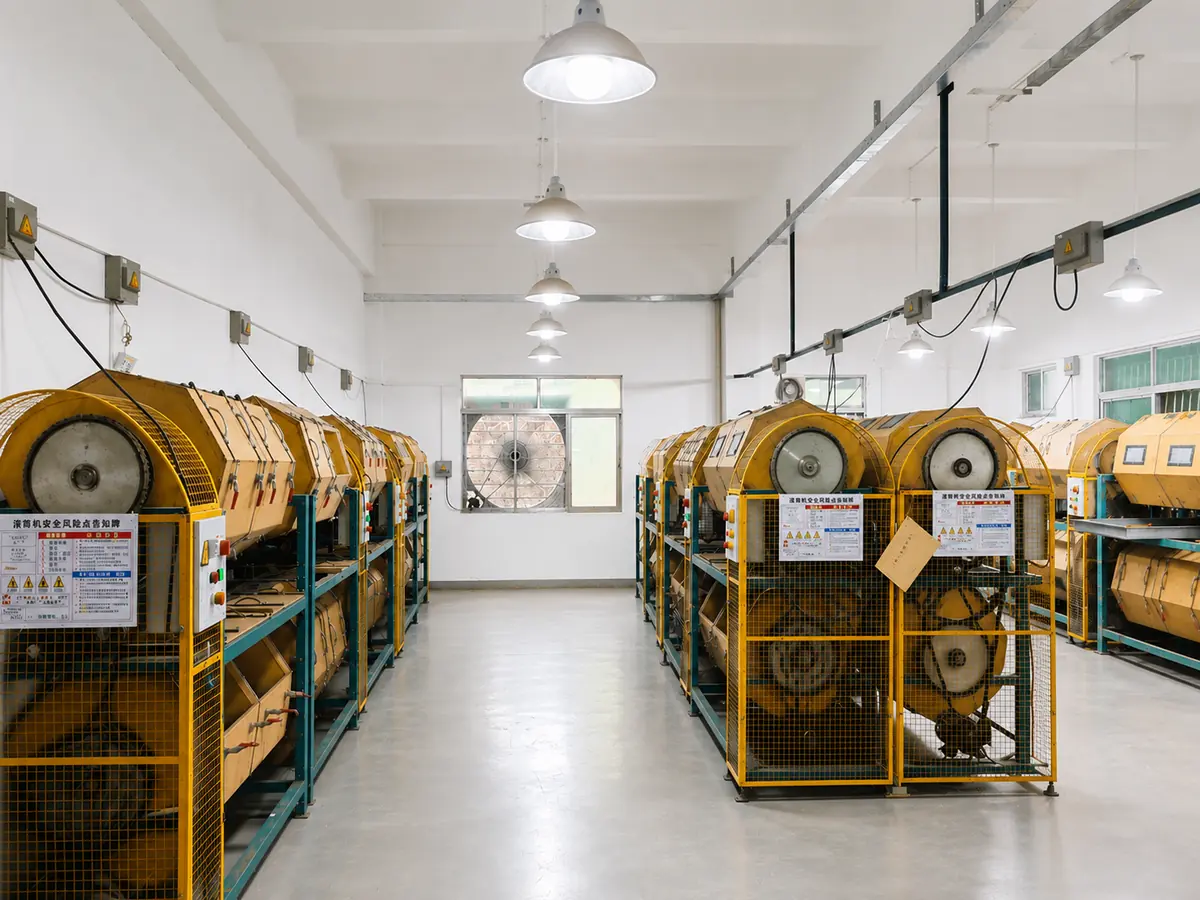 Eyewear frame tumbling and polishing workshop at Seesun eyeglasses factory